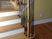 Custom wood StaircaseInstallation by District Flooring & Restoration 