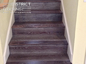 Custom wood StaircaseInstallation by District Flooring & Restoration 