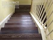 Custom wood StaircaseInstallation by District Flooring & Restoration 