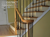 Custom wood StaircaseInstallation by District Flooring & Restoration 