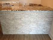 Natural stone installation by District Flooring & Restoration 