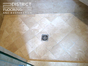 Travertine stone installation by District Flooring & Restoration 