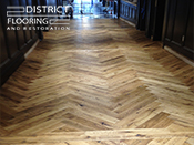 Hardwood floor custom design & custom stains by District Flooring & Restoration 